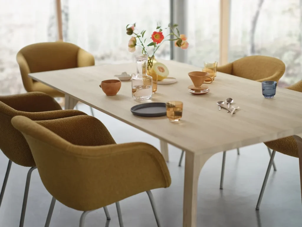 earnest-extendable-table-205-oak-fiber-soft-tube-hearth-8-grey-raise-carafe-glass-clear-burnt-orange-dark-blue-muuto-org